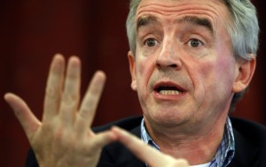 Ryanair CEO Michael O'Leary gestures during a news conference in Madrid, September 20, 2012. Ryanair has welcomed a meeting between Irish and Spanish aviation authorities to resolve a dispute between the airline and the Spanish government over safety standards. Ryanair has accused the Spanish aviation authorities of falsifying information on incidents involving its planes, an accusation Spanish officials have rejected.  REUTERS/Paul Hanna  (SPAIN - Tags: TRANSPORT TRAVEL BUSINESS)